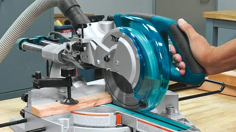 Makita 8-1/2” Single Bevel Sliding Compound Miter Saw in use on a workbench