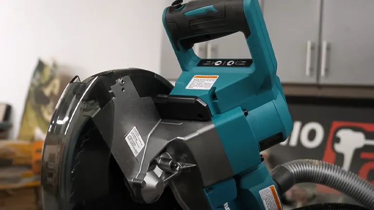 Makita 40V Max XGT 10” Dual-Bevel Sliding Compound Miter Saw in a workshop setting