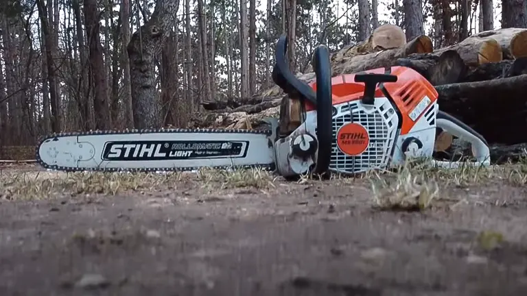a Stihl MS 500i Chainsaw lying on the ground
