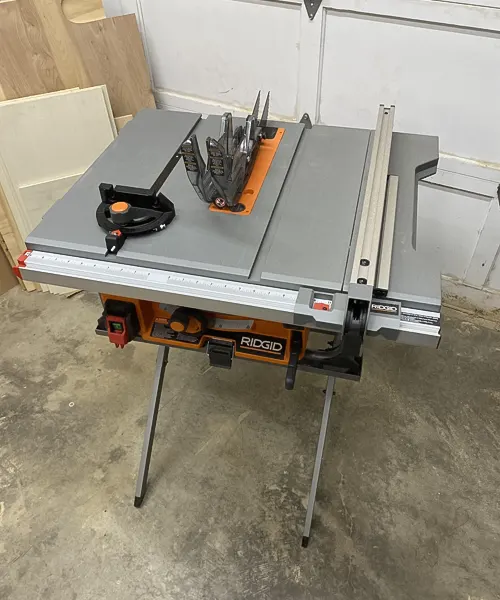 RIDGID R4518 10-Inch Portable Table Saw with Stand in a workshop setting