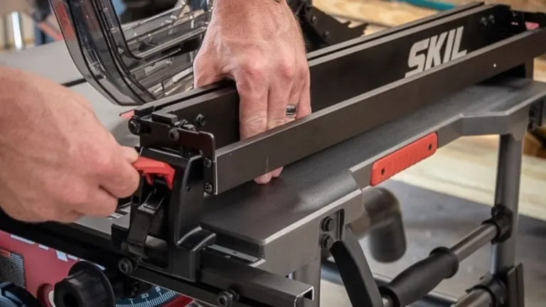 Person using a black and red SKIL TS6307-00 table saw in a workshop