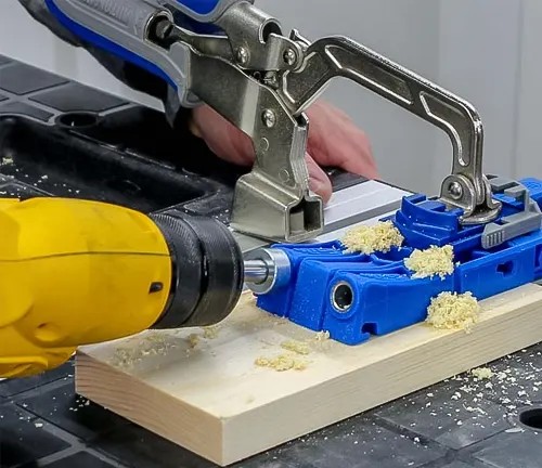 Blue box joint jig used for precision cuts on table saw