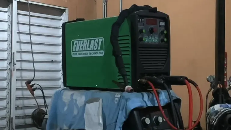 Everlast Power 185DV AC/DC TIG Stick Welder on a workbench in a workshop setting