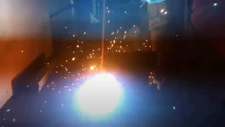 Welding process in action with bright light and sparks using an Everlast Power 185DV AC/DC TIG Stick Welder