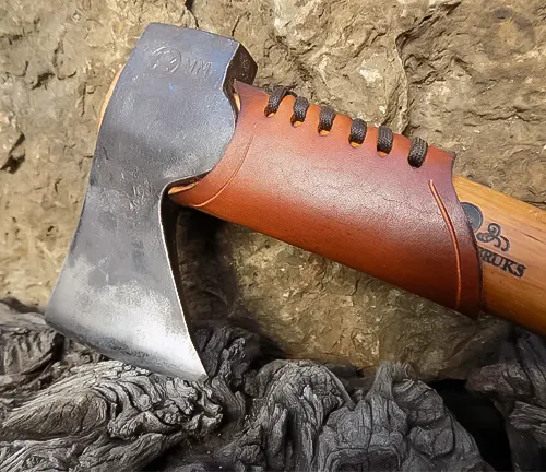 Gransfors Bruks Wildlife Hatchet with a leather grip on rocky terrain