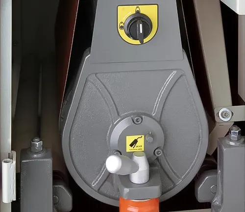Close up of the Grizzly G0527 - 18 Inches 5 HP Wide-Belt Sander’s control panel and belt tensioning mechanism
