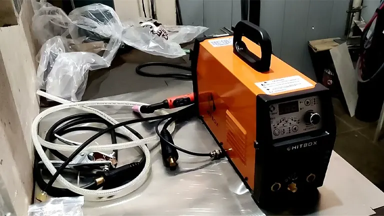HBT2000 TIG ARC Welding Machine with cables and accessories on a floor