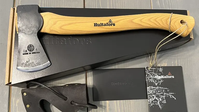 Hultafors outdoor hatchet with a wooden handle, displayed with its packaging