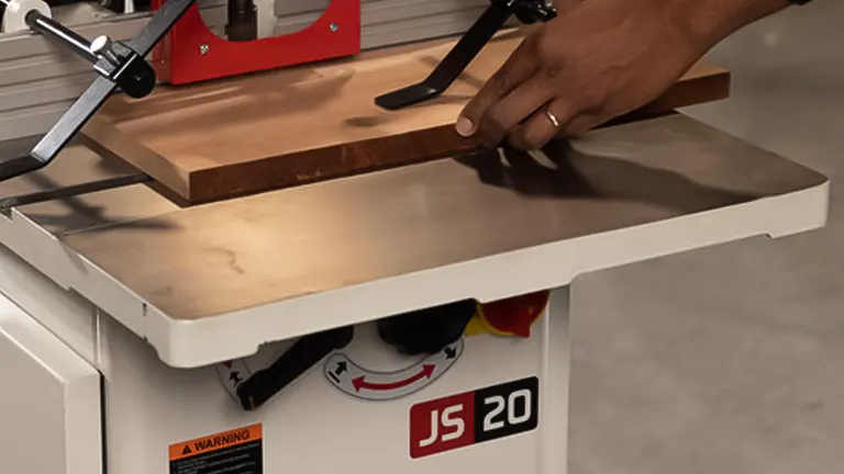 JET Shaper JWS-22CS Shaper in use on a wooden board on a gray table