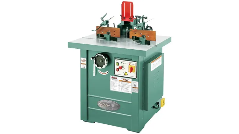 Grizzly G5912Z woodworking machine in green color with a table and multiple cutting and shaping tools on top