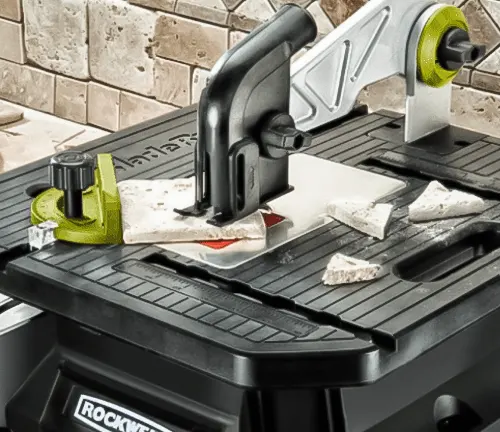 Close-up of Rockwell RK7323 BladeRunner X2 Portable Tabletop Saw with wood on table