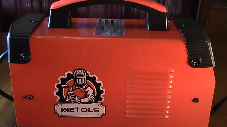 WETOLS 2-IN-1 Stick Welder with Lift TIG featuring a large WETOLS logo and an illustration of a welder mascot
