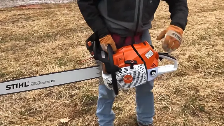 Person holding a STIHL MS 881 Magnum Chainsaw