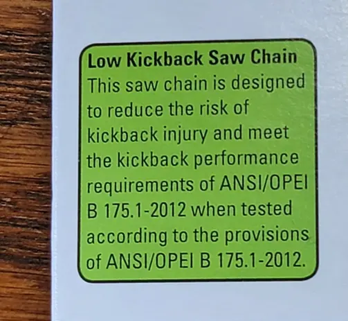 label with white text providing information about a “Low Kickback Saw Chain”
