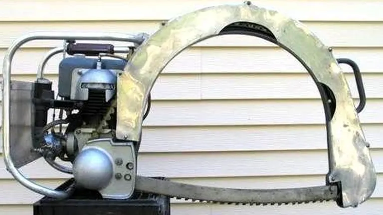 vintage precision chain saw from 1946, featuring a unique, circular design and a metal body with visible signs of wear and aging