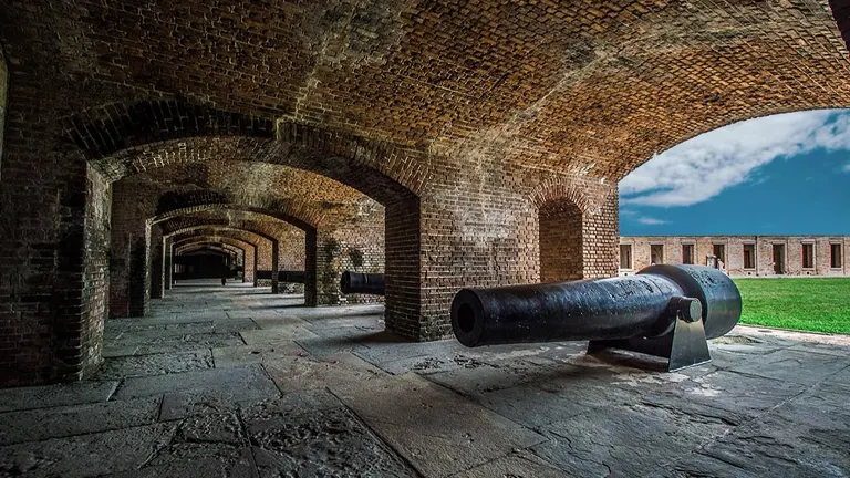 Cannons inside the brick archways of Fort Zachary Taylor Historic State Park
