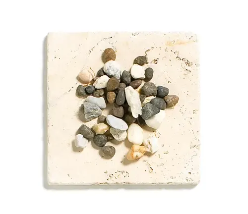 a variety of small stones and river rocks of different shapes, sizes, and colors