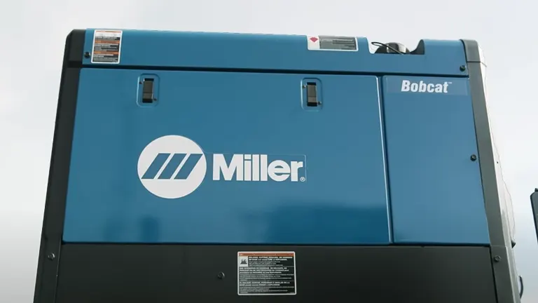 Miller Bobcat 230 power generator with logo and information labels