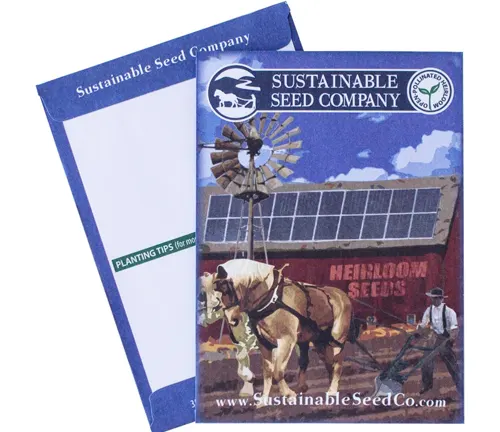 Two seed packets from Sustainable Seed Company, one featuring an illustration of a horse with solar panels and a windmill, indicating heirloom seeds, with a blue border and the company's website address.