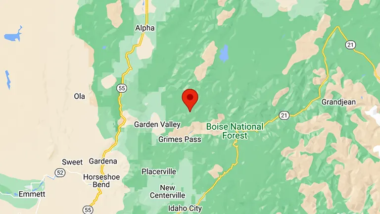 Map showing the location of Boise National Forest with a red pin indicating a specific point of interest within the forest, surrounded by roadways and nearby geographic locations like Garden Valley and Idaho City.