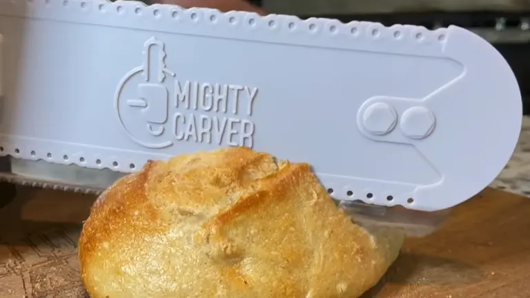Mighty Carver Electric Carving Knife used in cutting bread