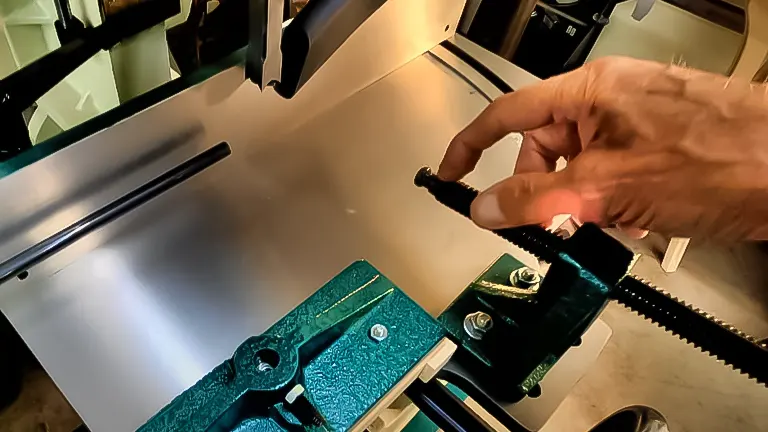 Hand setting a square chisel bit into the head of a Grizzly G0448 heavy-duty mortiser