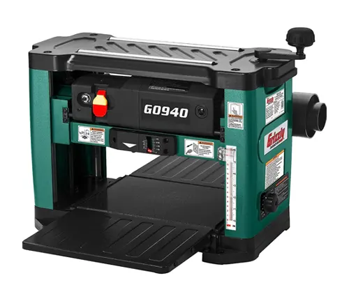 Grizzly G0940 13-inch benchtop planer with visible helical cutterhead and measurement scale