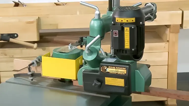 Grizzly 1/4 HP power feeder on a woodworking machine