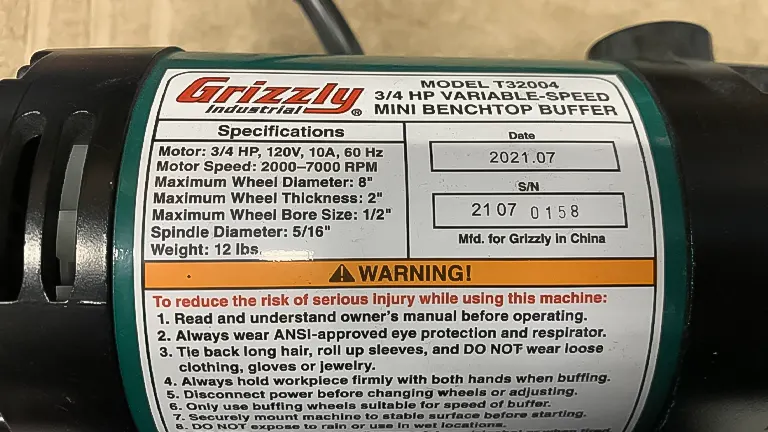 Label on Grizzly T32004 Benchtop Buffer detailing specifications and safety warnings