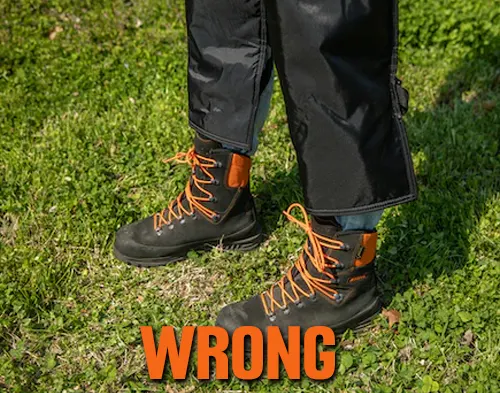 Person using STIHL Chainsaw Protective Chaps but in a wrong way