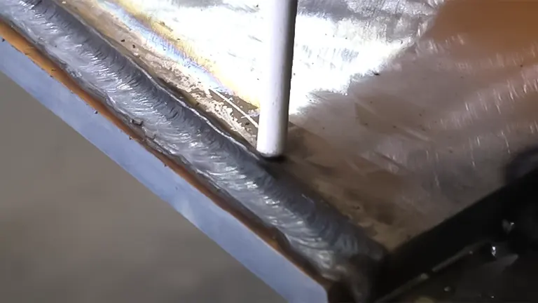 Stick electrode over a consistent weld bead on metal