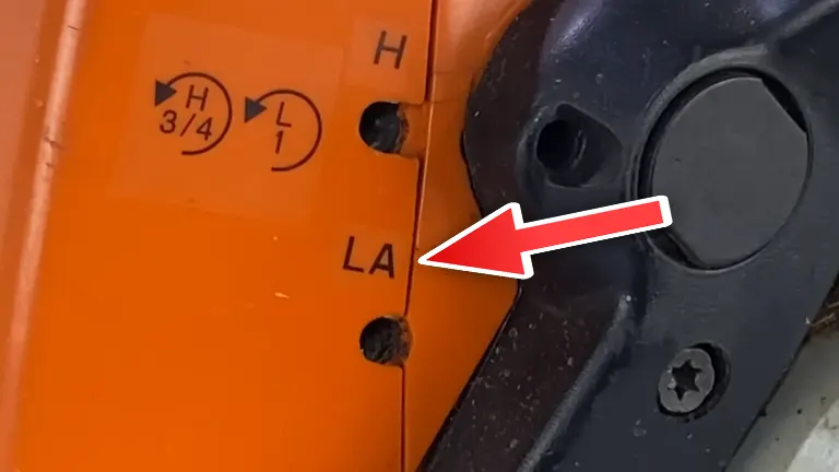 Stilh Chinsaw with A Symbol H L and LA and a red arrow pointing on LA