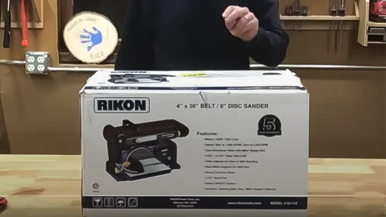 Boxed Rikon 50-112 Sander on a workbench with features listed