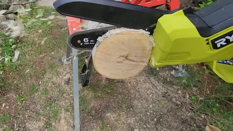 Ryobi Mini Chainsaw cut half of the log