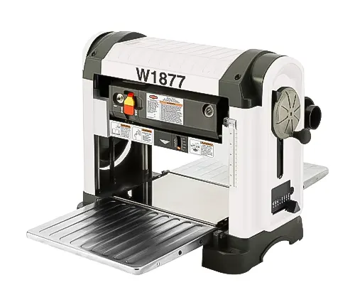 Shop Fox W1877 13-inch benchtop planer with visible spiral-style cutterhead and stainless steel table