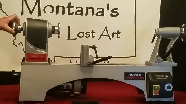 Nova Comet 14DR lathe in front of 'Montana's Lost Art' signage