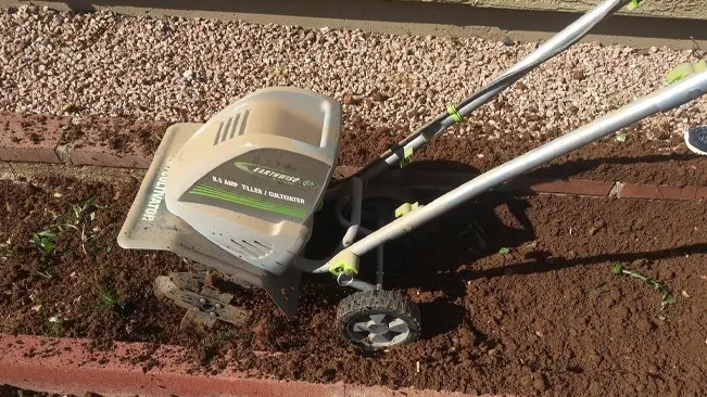 Earthwise tiller on freshly aerated soil