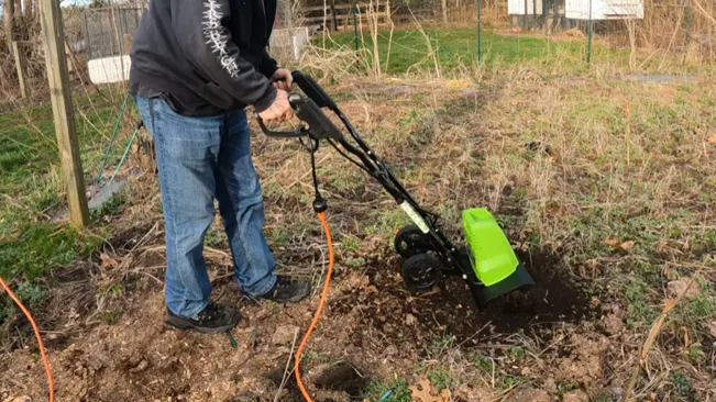 Person using GreenWorks Cultivator