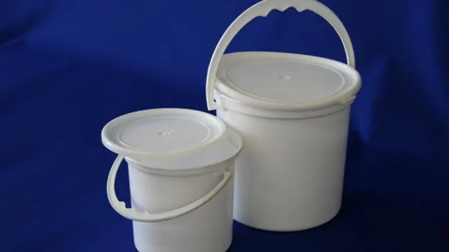 Two white buckets with lids