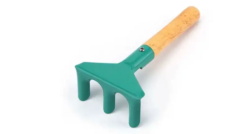green Kinderific garden rake with a wooden handle