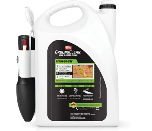 Ortho GroundClear Weed & Grass Killer in a white container with a built-in sprayer.