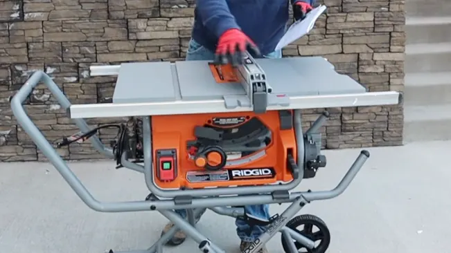 Portable table saw on wheeled stand