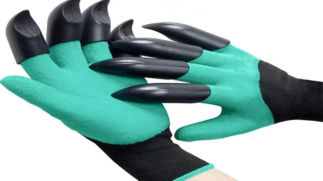 pair of gardening gloves in turquoise and black with digging claws on the fingertips