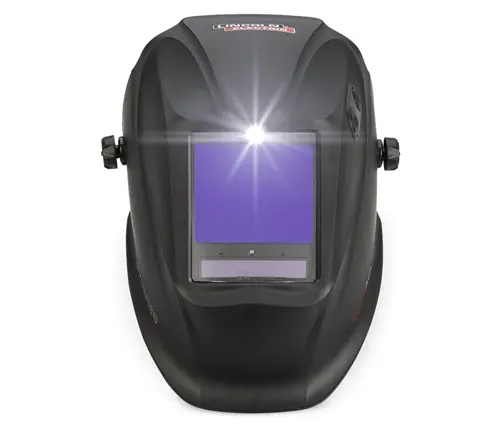Front view of a Lincoln Electric Viking 3350 welding helmet with a radiant light effect on the lens.