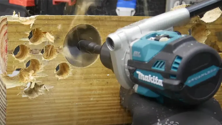 The image shows a Makita cordless hammer drill in action, with a drill bit penetrating a wooden plank that has multiple holes, highlighting the tool's capability and effectiveness in woodworking tasks.