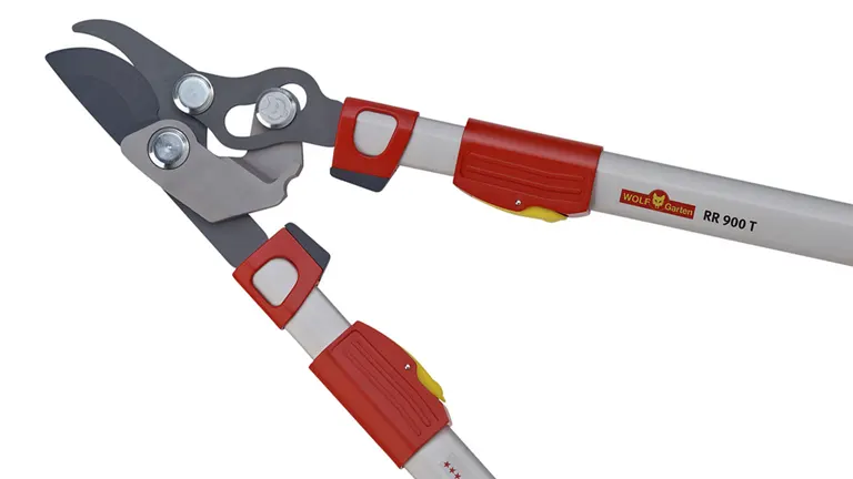 An image of WOLF-Garten RR900T Power Cut Telescoping Bypass Loppers, featuring extended silver handles with red grips, and a grey and black cutting head with silver bolts.