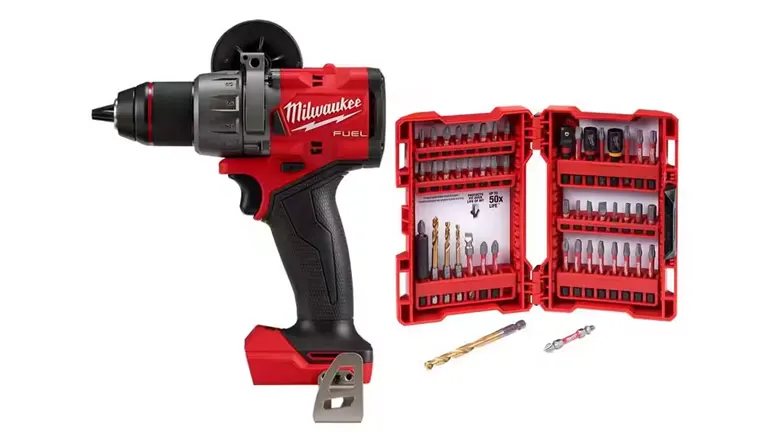 A red and black Milwaukee M18 Fuel Hammer Drill/Driver displayed alongside an open case of various drill and driver bits, including gold-toned and black oxide bits, all isolated on a white background.
