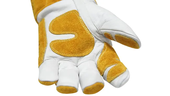 Close-up of a Revco GM1611 welding glove with yellow and white leather design.
