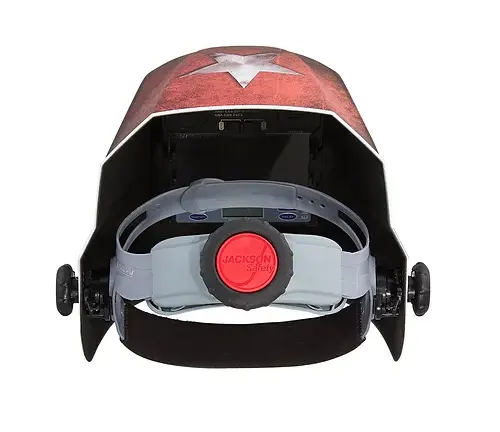 Rear interior view of a Jackson Safety auto-darkening welding helmet, highlighting the adjustable headgear.