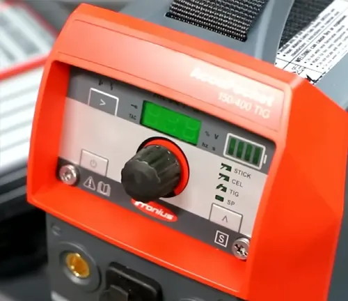 Close-up of the control panel on a Fronius AccuPocket 150 TIG/Stick Welder with a digital screen and selector knob.